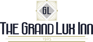 The Grand Lux Inn Logo